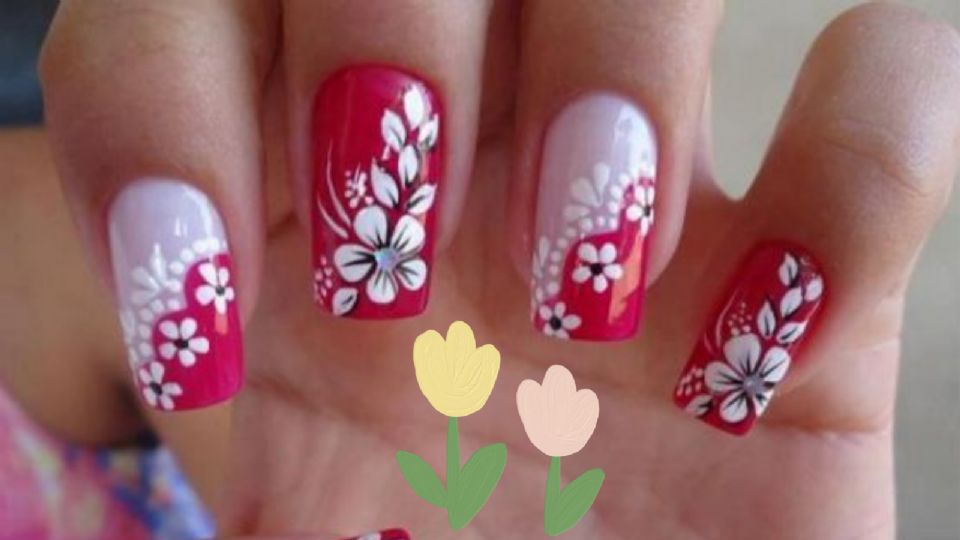 Diseño de uñas con flores en colores rojo y blanco.